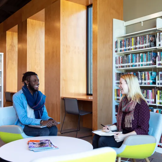 Man and women sit and talk at Richland Library