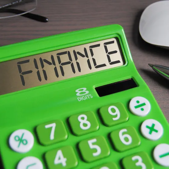 The word "finance" spelled out on a calculator screen