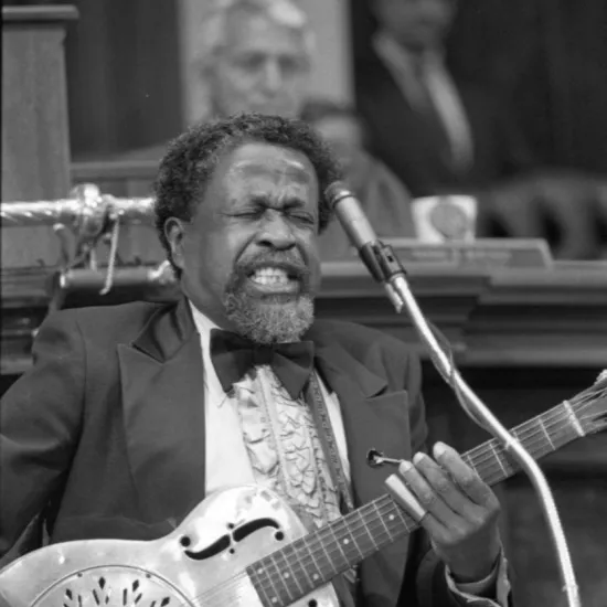Drink Small plays for legislators, 1990