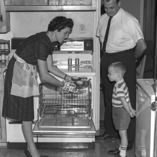 Mrs. Barker with stuffed peppers 1963